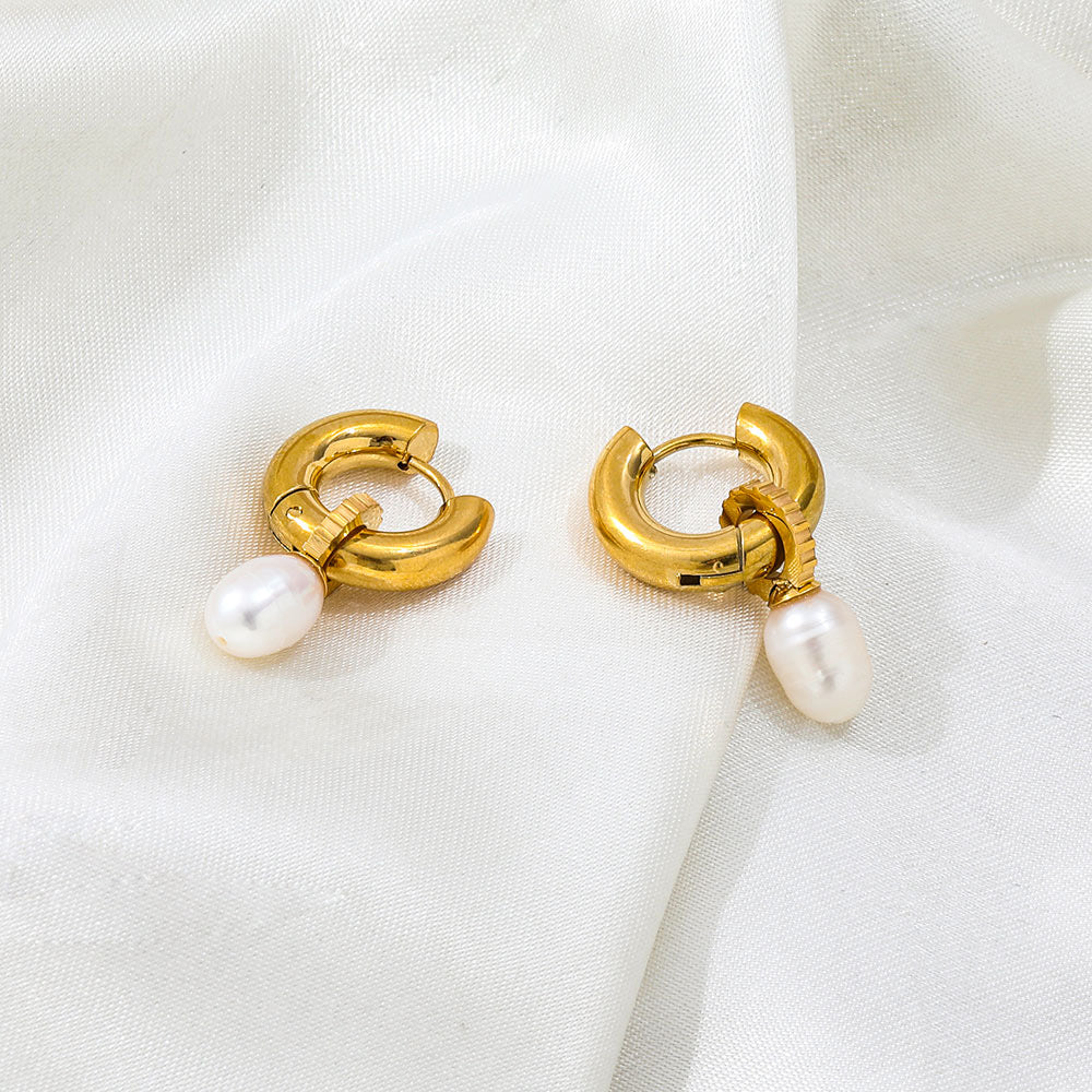 Gold huggie pearl drop