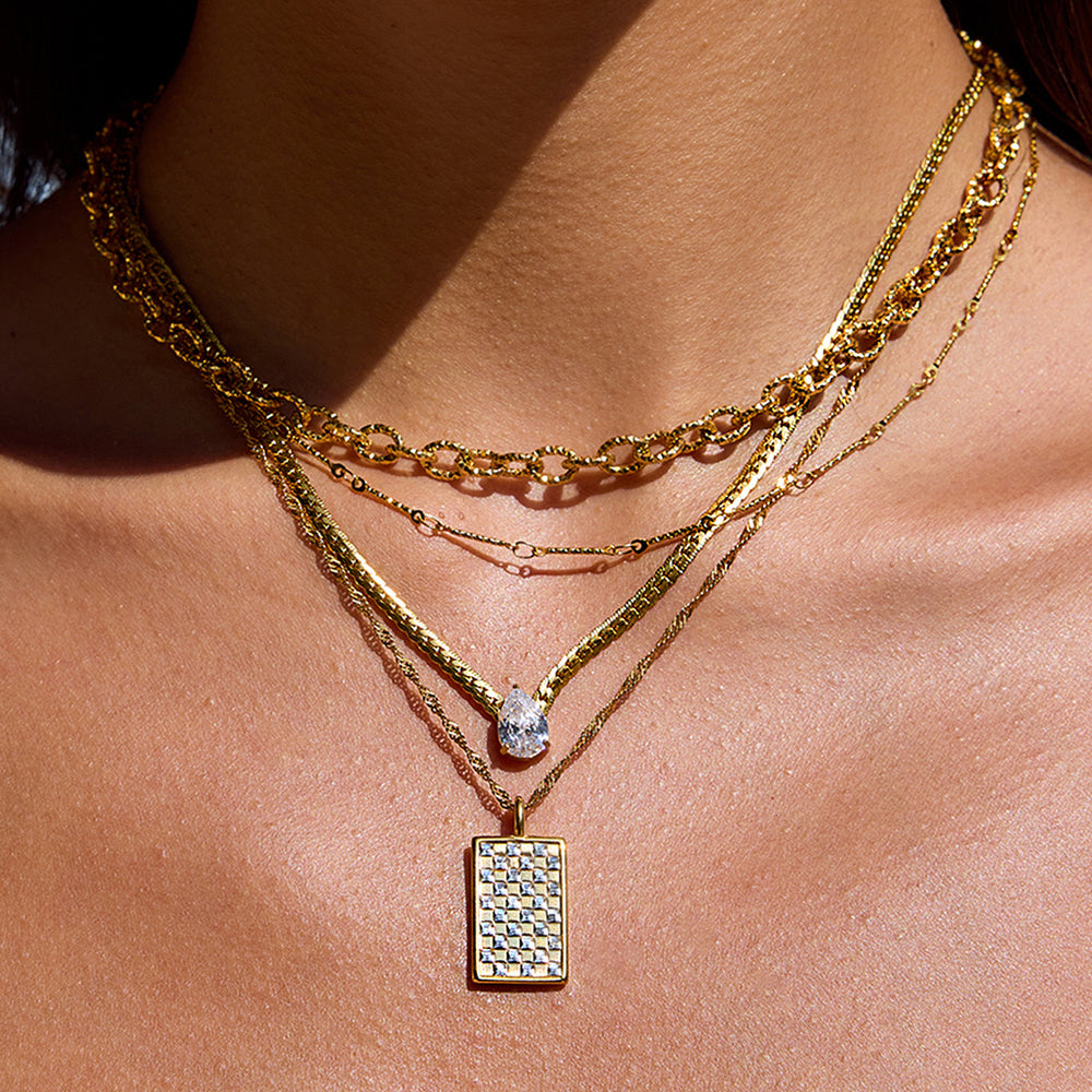 Gold, studded pendant necklace